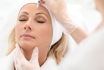 woman receiving injectable treatment hollywood dermatology