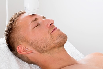Man getting laser treatments