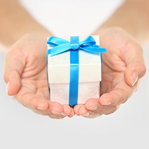 Hands holding a gift