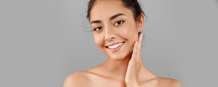 Woman smiling with clear skin