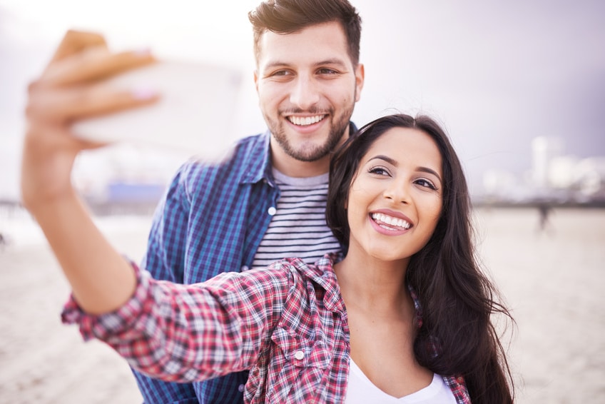 Happy couple taking a selfie