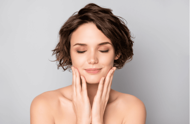 lady short bob hairstyle enjoy rejuvenation spa with soft silky facial skin eyes closed