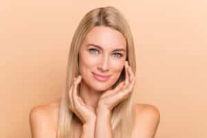 Mature woman with firm, beautiful skin after boosting collagen with Morpheus8 treatment.